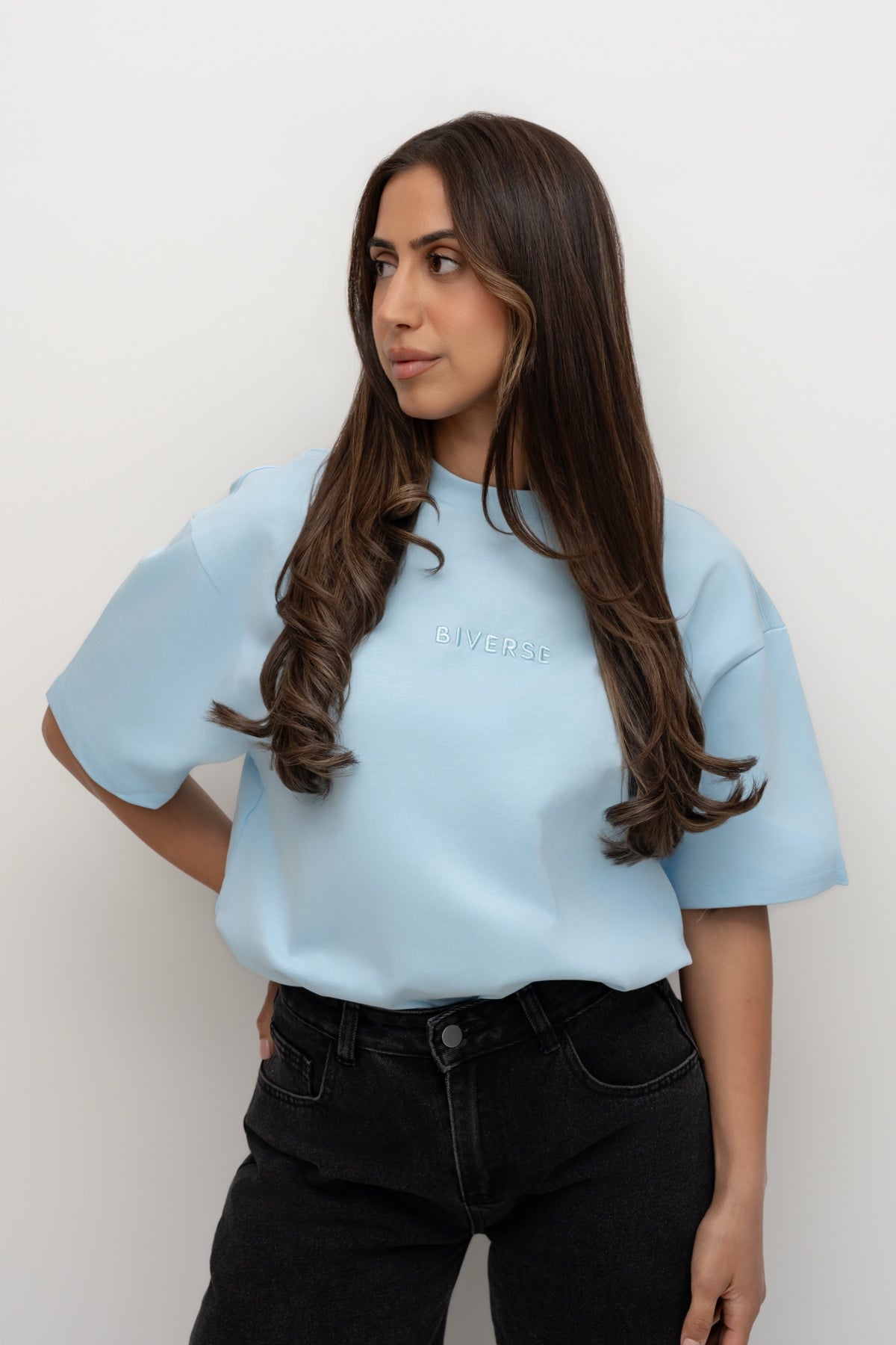 Model wearing the Sky blue BIVERSE tee, front view.