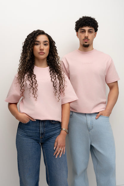 Models wearing Blush pink BIVERSE tees, front view.