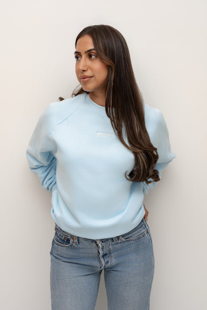 Model wearing the Sky blue BIVERSE crewneck, front view.