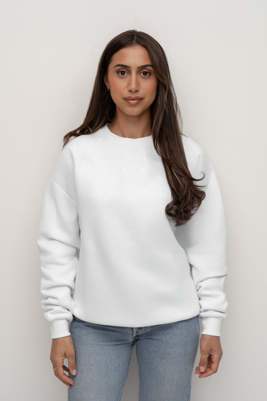 Model wearing the Snow white BIVERSE crewneck, front view.